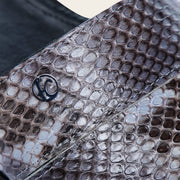 Sandalia en piel genuina de pitón para dama Sandalia 