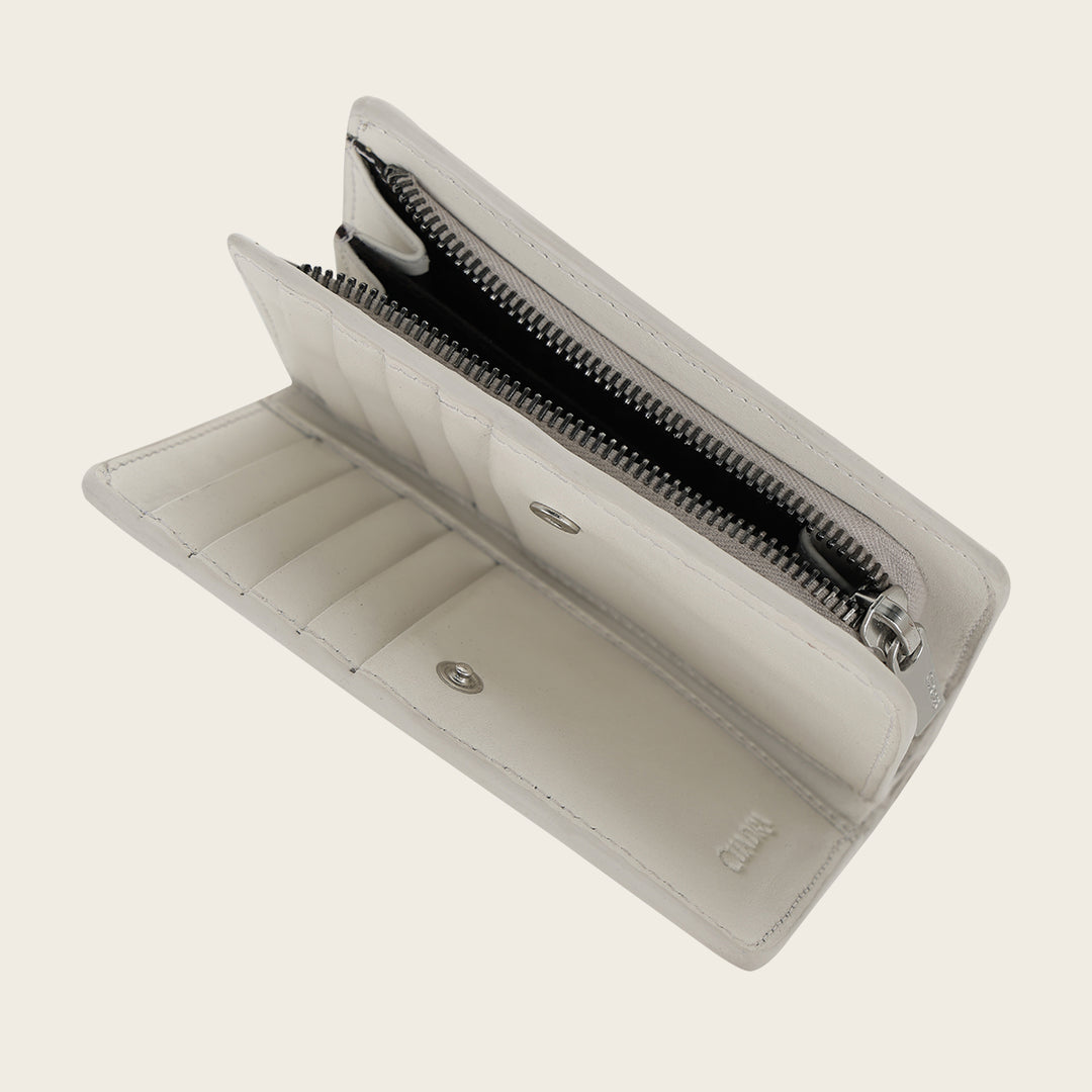 Cartera en piel genuina de niloticus para dama