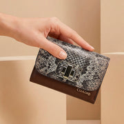 Cartera en piel genuina de pitón para dama