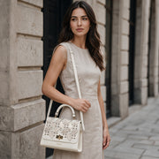Bolso satchel en piel genuina de niloticus para dama