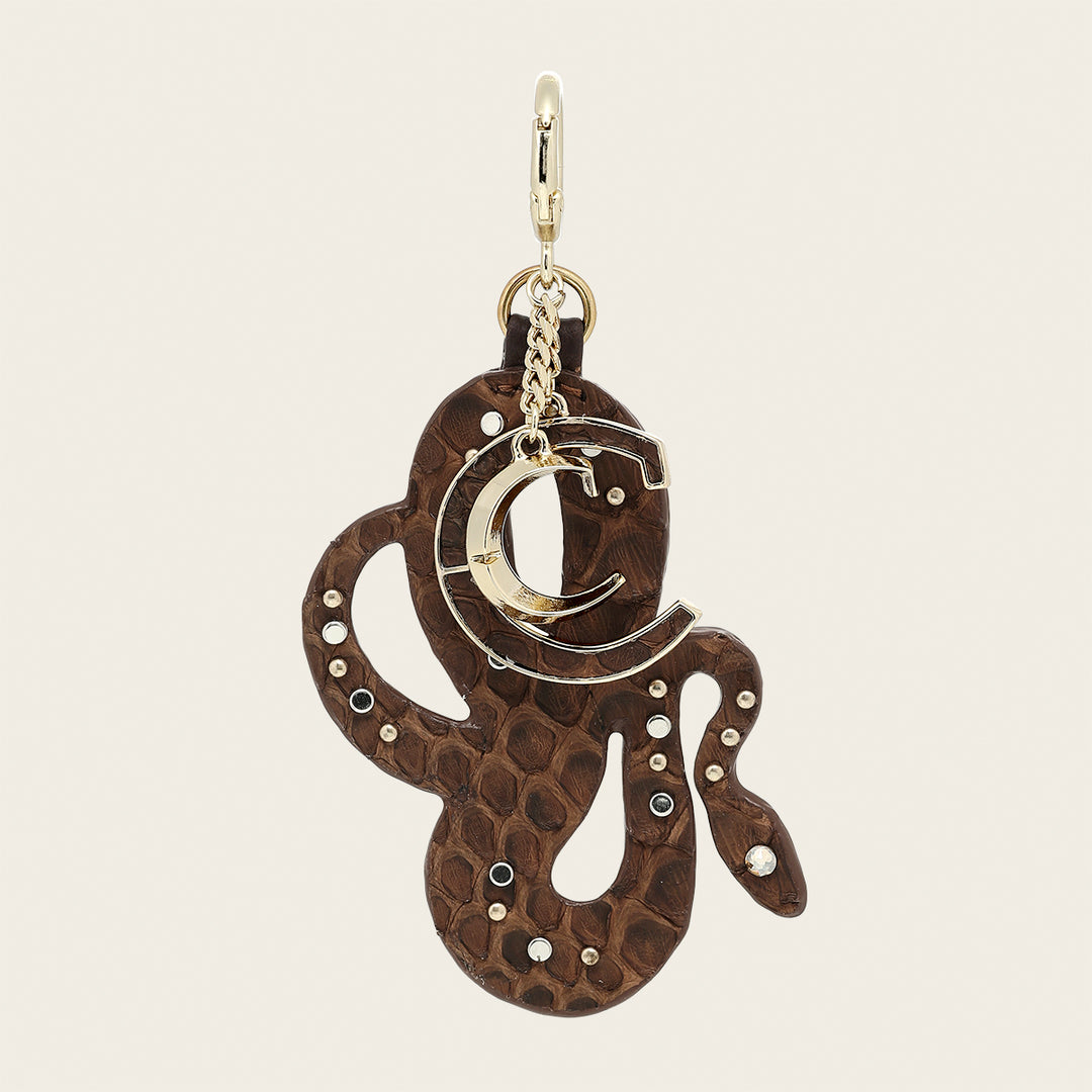 Charm de serpiente en piel genuina de pitón para dama