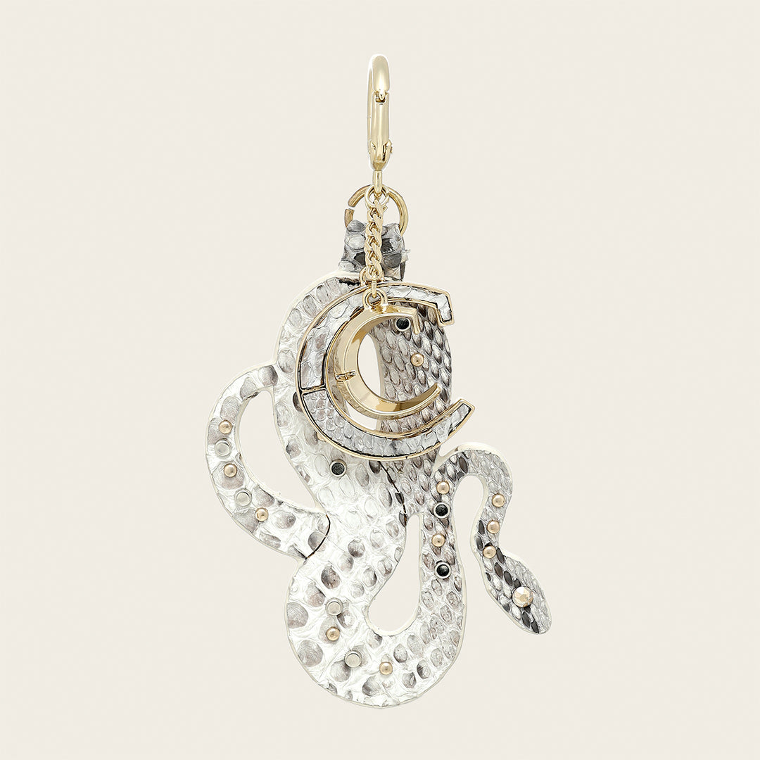 Charm de serpiente en piel genuina de pitón para dama