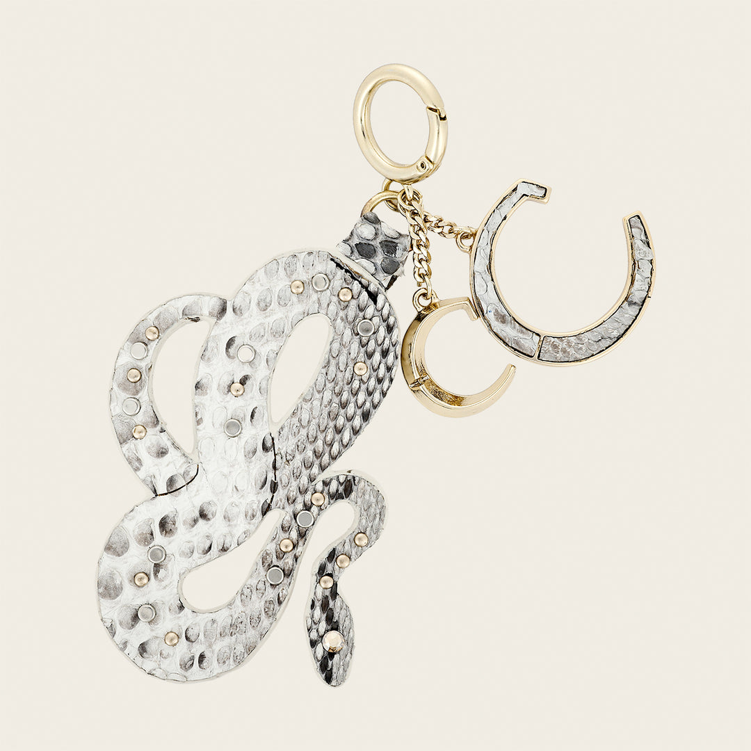 Charm de serpiente en piel genuina de pitón para dama