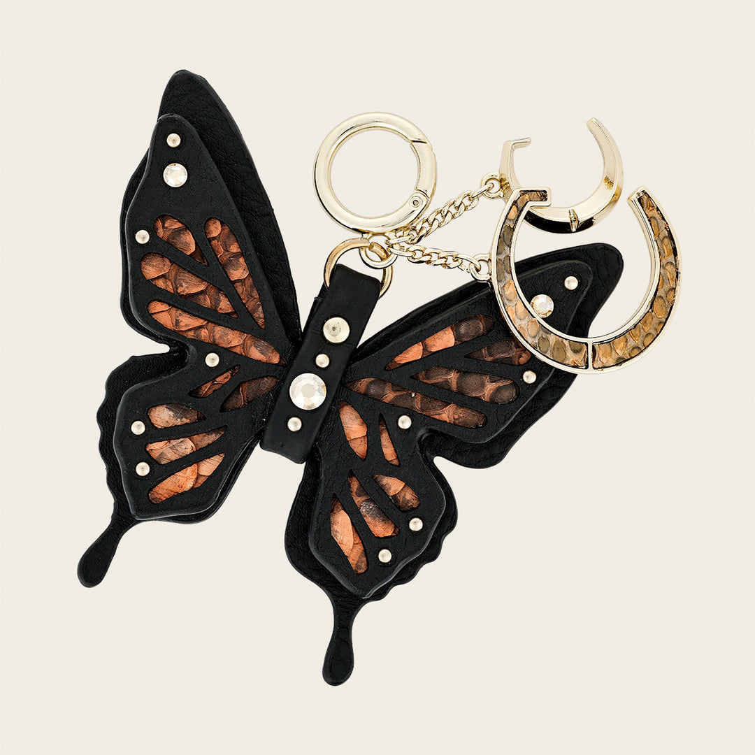 Charm de mariposa en piel genuina de pitón para dama