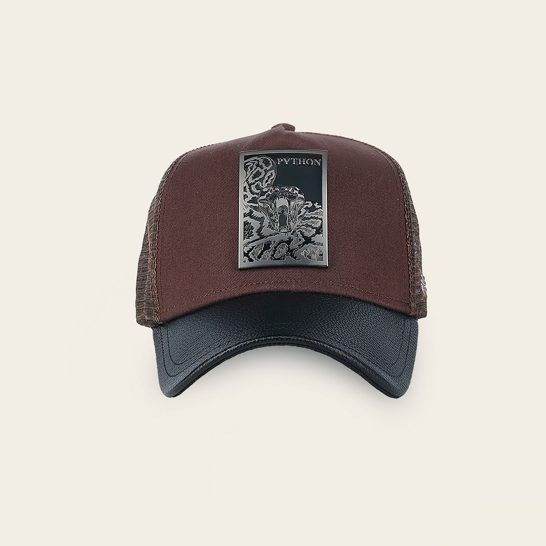 Gorra en piel genuina con diseño de pitón