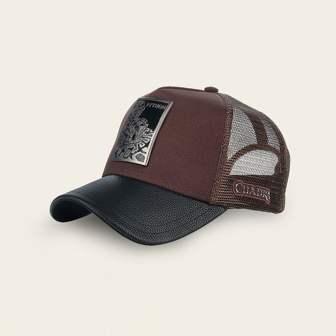 Gorra en piel genuina con diseño de pitón